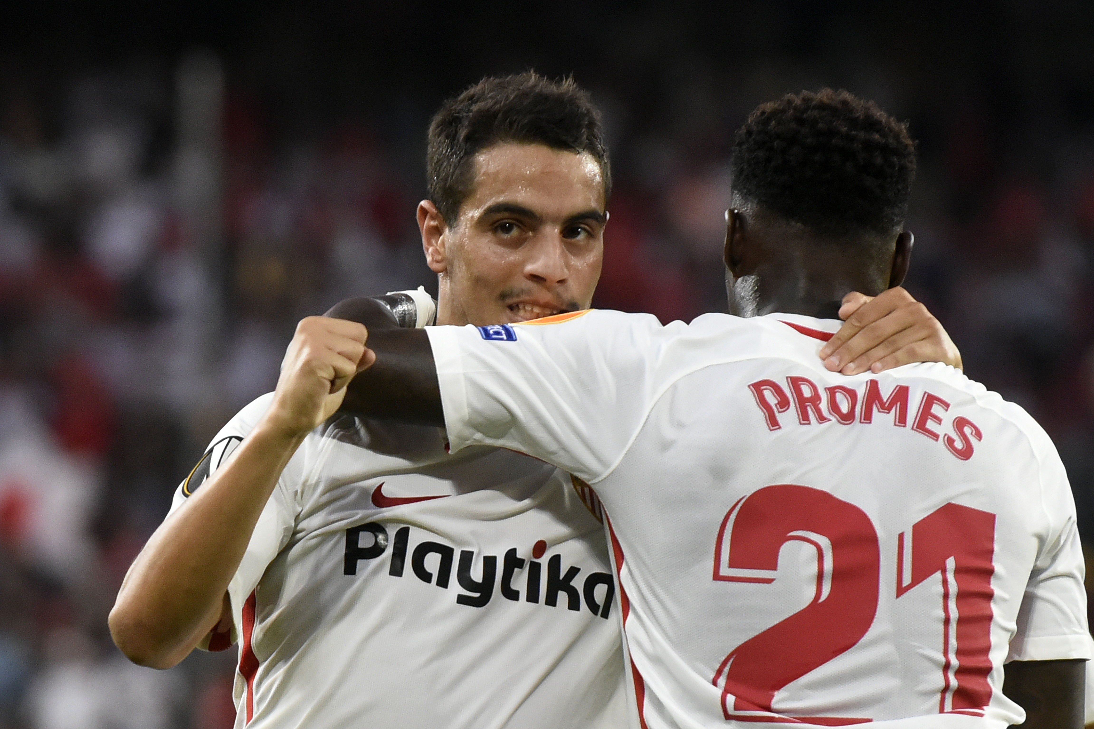 Ben Yedder celebrates a goal with Promes