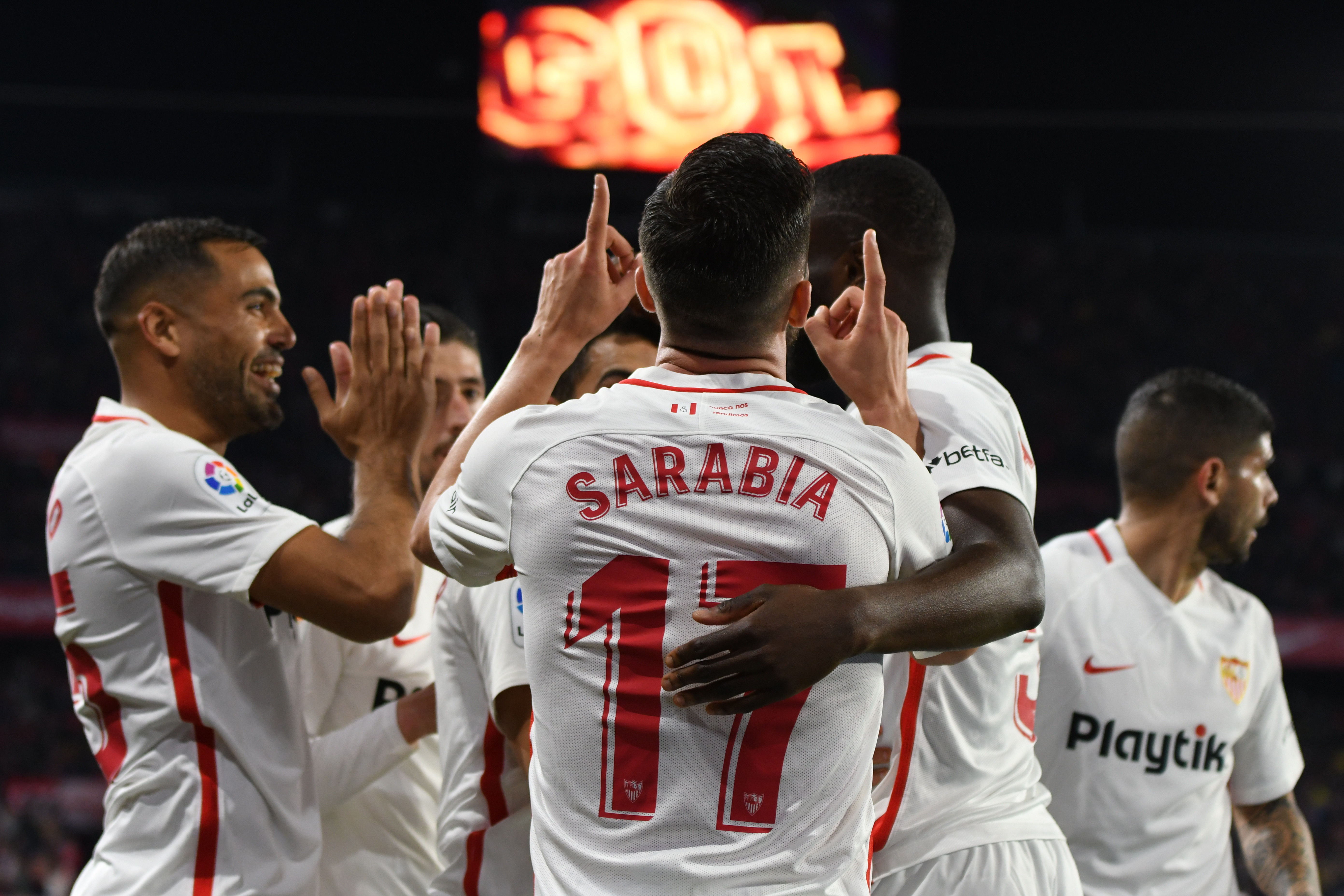 Sevilla FC celebrate their first goal against Barcelona