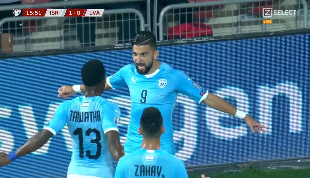 Dabbur celebrates a goal with Israel