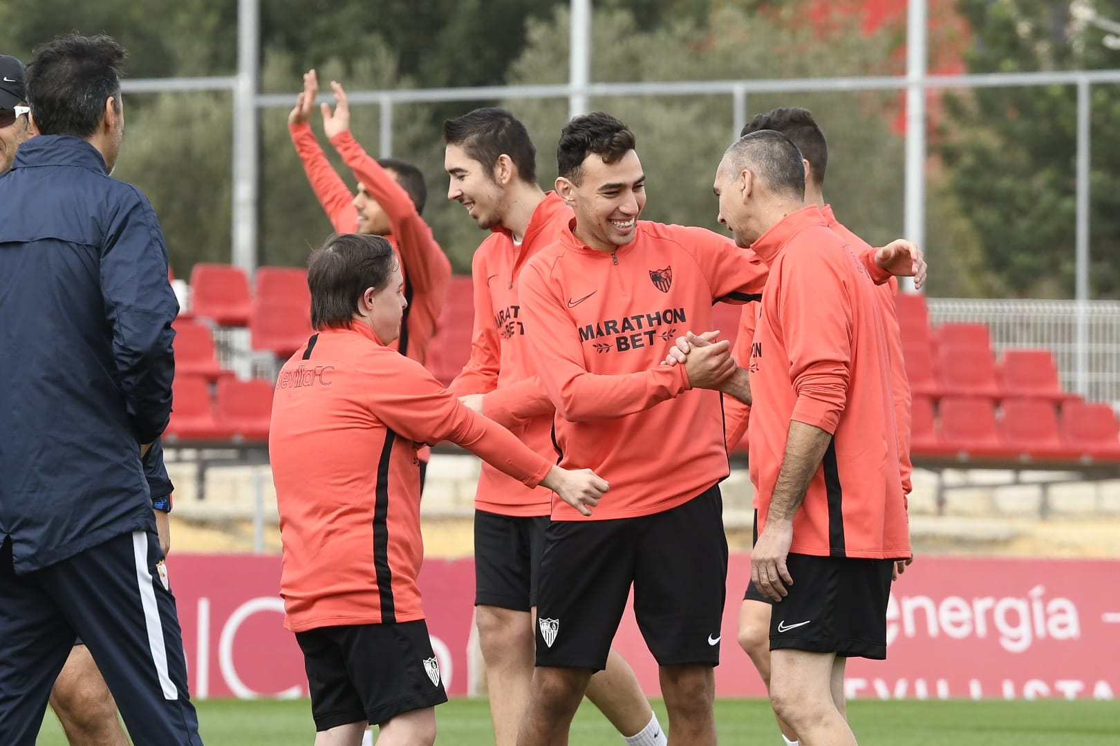 Sevilla FC training with Sevilla FC Genuine