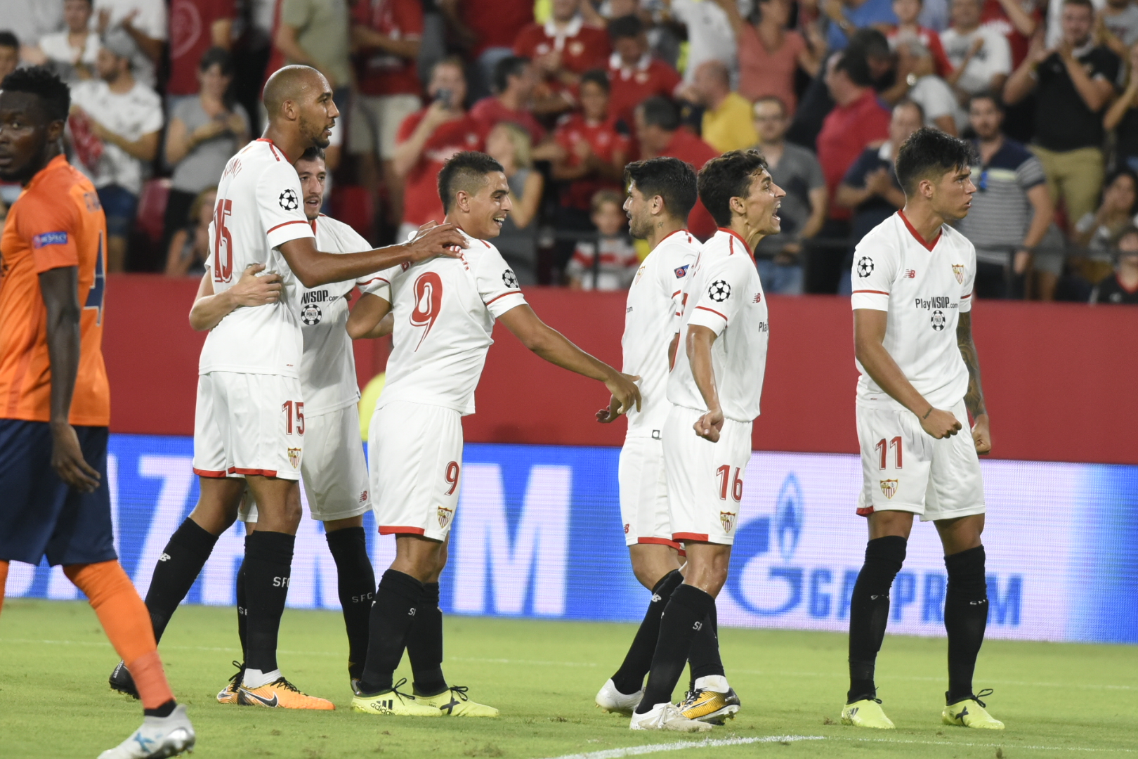 Sevilla FC players celebrate a goal