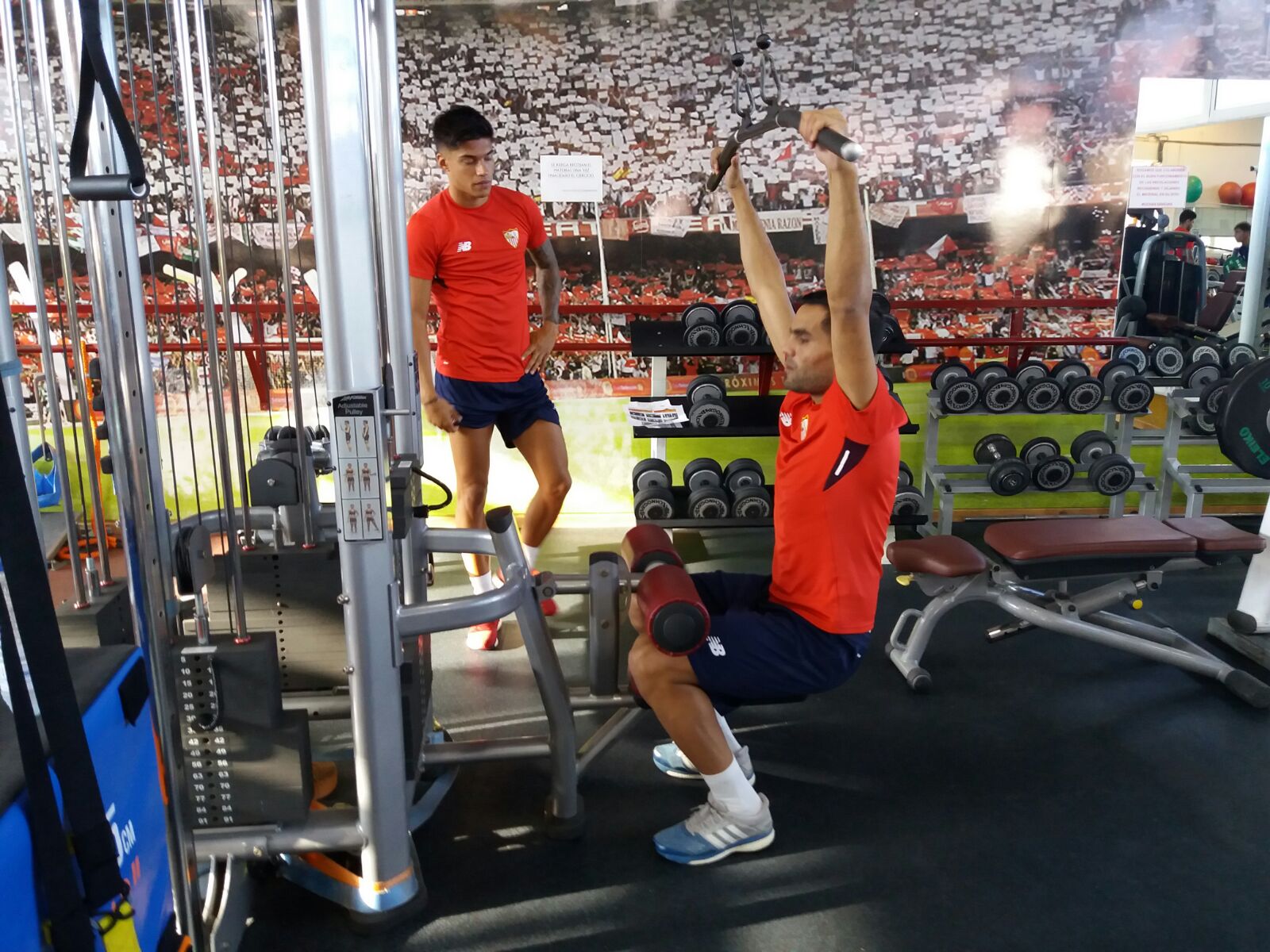 Mercado and Correa in the gym
