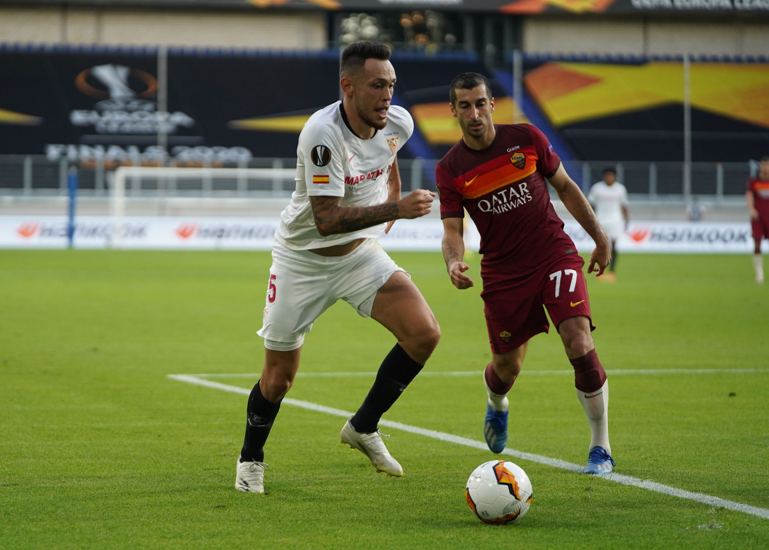 Ocampos against Mkhitaryan in the Europa League last season