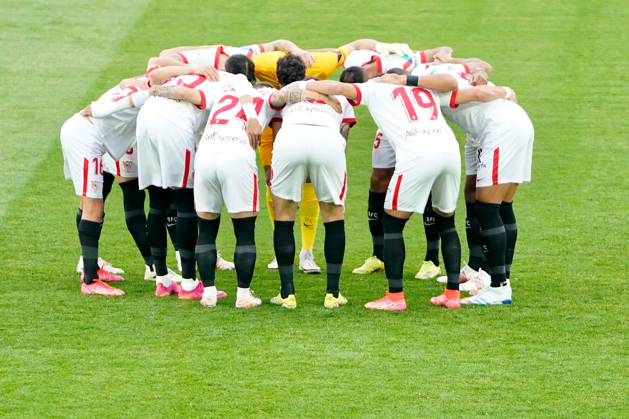 Sevilla FC come together before a game