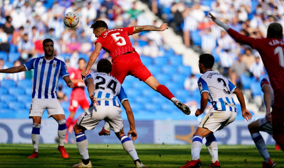 Ocampos heads the ball in Real Sociedad-Sevilla FC