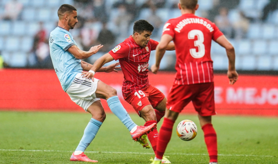 Defensive action for Sevilla FC against RC Celta de Vigo