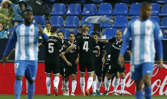Ben Yedder celebrates Correa's goal in Málaga