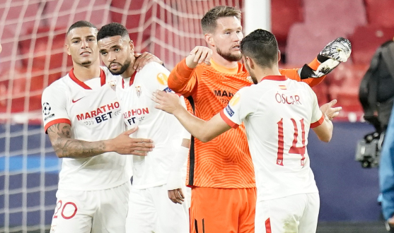 Sevilla players celebrate the win against Krasnodar