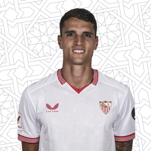Erik Lamela posando con la camiseta del Sevilla fc